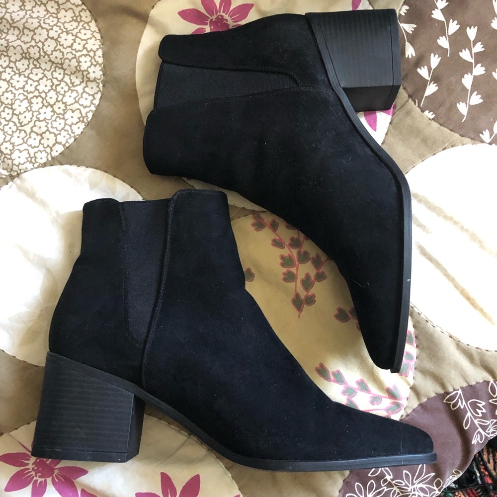 Black in black ankle booties